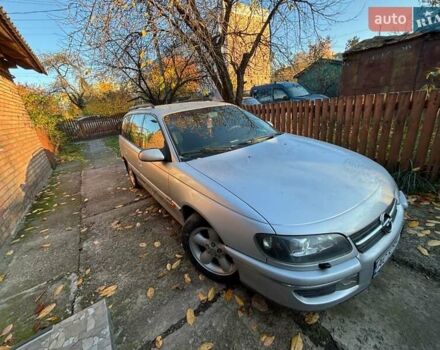 Сірий Опель Омега, об'ємом двигуна 2 л та пробігом 440 тис. км за 1900 $, фото 1 на Automoto.ua