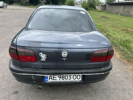 Сірий Опель Омега, об'ємом двигуна 2 л та пробігом 300 тис. км за 2350 $, фото 1 на Automoto.ua