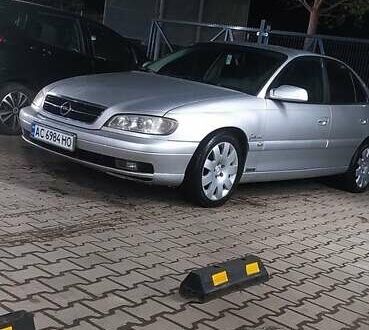 Серый Опель Омега, объемом двигателя 2.5 л и пробегом 330 тыс. км за 1400 $, фото 1 на Automoto.ua