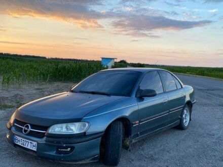 Сірий Опель Омега, об'ємом двигуна 2 л та пробігом 180 тис. км за 1900 $, фото 1 на Automoto.ua