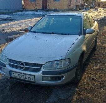 Серый Опель Омега, объемом двигателя 2 л и пробегом 430 тыс. км за 2550 $, фото 1 на Automoto.ua
