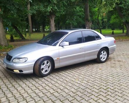 Серый Опель Омега, объемом двигателя 2.5 л и пробегом 306 тыс. км за 3500 $, фото 1 на Automoto.ua