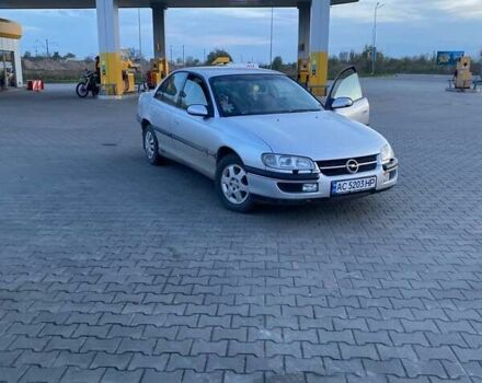 Сірий Опель Омега, об'ємом двигуна 2 л та пробігом 500 тис. км за 2000 $, фото 1 на Automoto.ua