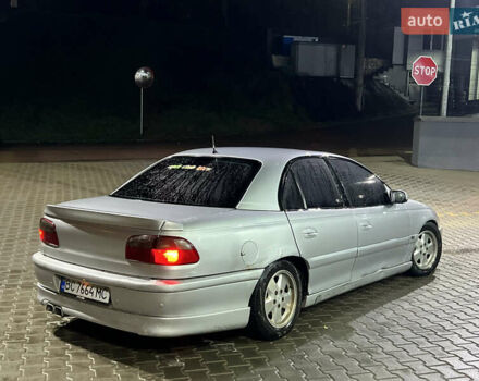 Серый Опель Омега, объемом двигателя 2.5 л и пробегом 250 тыс. км за 1550 $, фото 1 на Automoto.ua