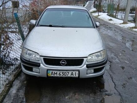 Серый Опель Омега, объемом двигателя 2.5 л и пробегом 283 тыс. км за 1200 $, фото 1 на Automoto.ua