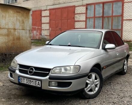 Серый Опель Омега, объемом двигателя 2 л и пробегом 290 тыс. км за 2400 $, фото 1 на Automoto.ua