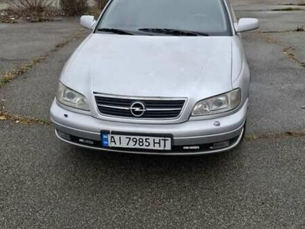 Серый Опель Омега, объемом двигателя 2.5 л и пробегом 310 тыс. км за 3200 $, фото 1 на Automoto.ua