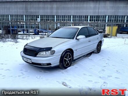 Серый Опель Омега, объемом двигателя 2.2 л и пробегом 300 тыс. км за 1900 $, фото 1 на Automoto.ua