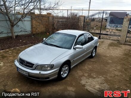 Серый Опель Омега, объемом двигателя 2.5 л и пробегом 300 тыс. км за 2500 $, фото 1 на Automoto.ua