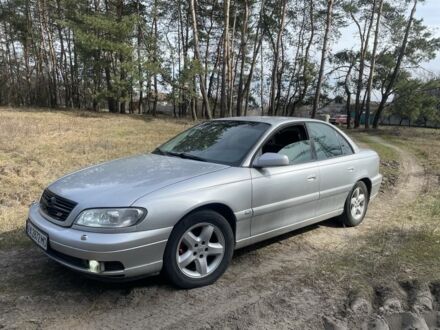 Серый Опель Омега, объемом двигателя 2.6 л и пробегом 320 тыс. км за 3300 $, фото 1 на Automoto.ua