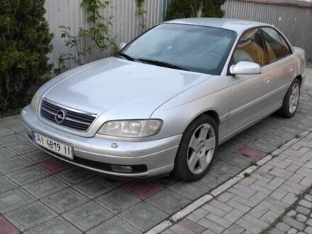 Серый Опель Омега, объемом двигателя 2.2 л и пробегом 290 тыс. км за 2100 $, фото 1 на Automoto.ua