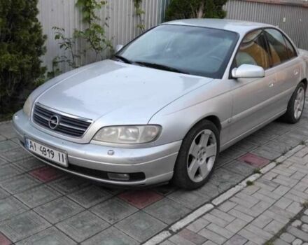 Серый Опель Омега, объемом двигателя 2.2 л и пробегом 290 тыс. км за 2100 $, фото 1 на Automoto.ua