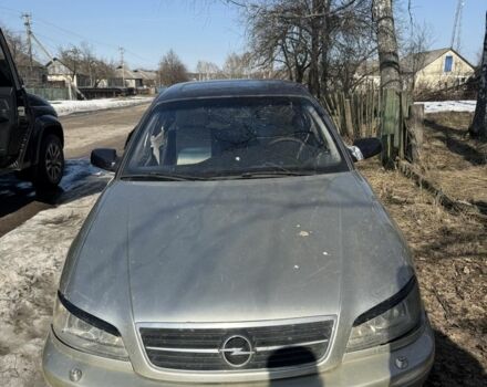 Серый Опель Омега, объемом двигателя 2.6 л и пробегом 260 тыс. км за 900 $, фото 1 на Automoto.ua