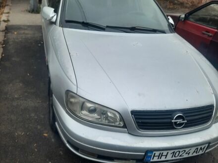 Серый Опель Омега, объемом двигателя 2.2 л и пробегом 320 тыс. км за 1800 $, фото 1 на Automoto.ua
