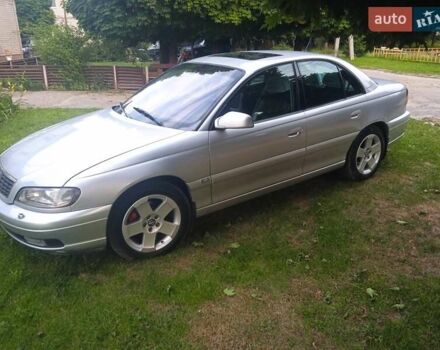 Серый Опель Омега, объемом двигателя 2.5 л и пробегом 263 тыс. км за 4000 $, фото 1 на Automoto.ua