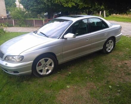 Серый Опель Омега, объемом двигателя 2.5 л и пробегом 263 тыс. км за 4000 $, фото 1 на Automoto.ua