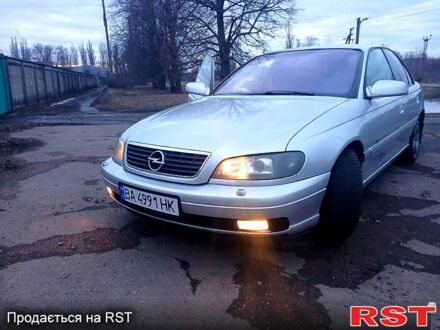 Серый Опель Омега, объемом двигателя 2.9 л и пробегом 300 тыс. км за 3650 $, фото 1 на Automoto.ua