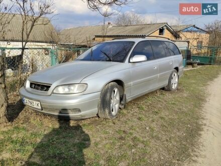 Серый Опель Омега, объемом двигателя 2.5 л и пробегом 251 тыс. км за 1200 $, фото 1 на Automoto.ua