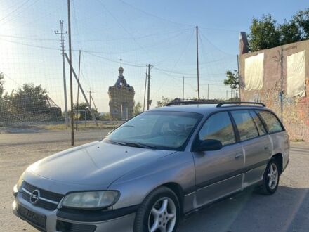 Сірий Опель Омега, об'ємом двигуна 2 л та пробігом 385 тис. км за 1104 $, фото 1 на Automoto.ua