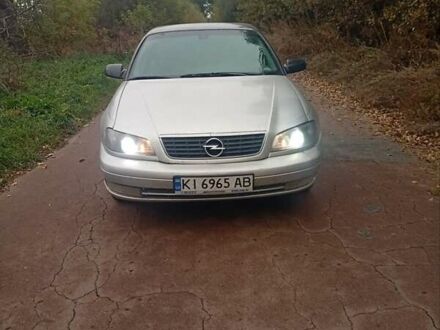 Серый Опель Омега, объемом двигателя 2.2 л и пробегом 331 тыс. км за 1900 $, фото 1 на Automoto.ua