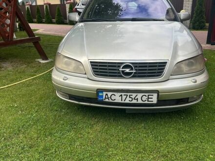 Серый Опель Омега, объемом двигателя 2.5 л и пробегом 255 тыс. км за 3886 $, фото 1 на Automoto.ua