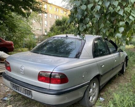 Сірий Опель Омега, об'ємом двигуна 2 л та пробігом 174 тис. км за 700 $, фото 1 на Automoto.ua