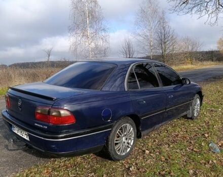 Синий Опель Омега, объемом двигателя 2 л и пробегом 350 тыс. км за 1670 $, фото 5 на Automoto.ua