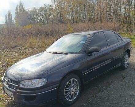 Синий Опель Омега, объемом двигателя 2 л и пробегом 350 тыс. км за 1670 $, фото 1 на Automoto.ua