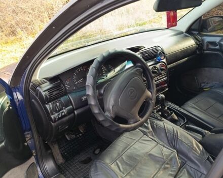 Синий Опель Омега, объемом двигателя 2 л и пробегом 350 тыс. км за 1670 $, фото 3 на Automoto.ua