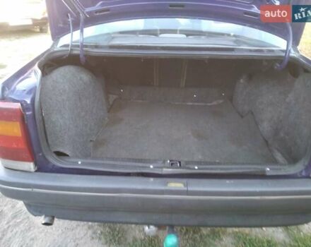 Синий Опель Омега, объемом двигателя 2 л и пробегом 270 тыс. км за 1500 $, фото 10 на Automoto.ua