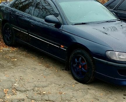 Синій Опель Омега, об'ємом двигуна 2 л та пробігом 300 тис. км за 3000 $, фото 3 на Automoto.ua