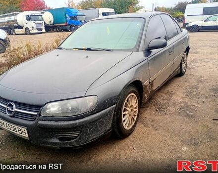 Опель Омега 1994 в Сумах на Automoto.ua Синий Опель Омега, объемом двигателя 2.5 л и пробегом 420 тыс. км за 1600 $, фото 4 на Automoto.ua