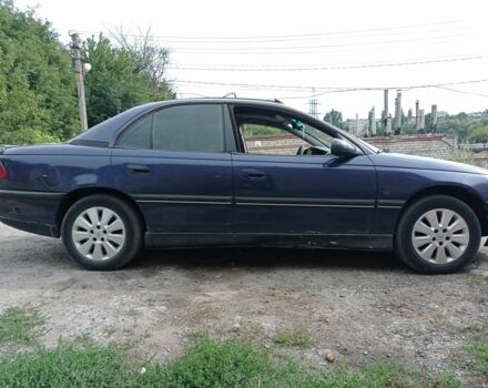 Синий Опель Омега, объемом двигателя 3 л и пробегом 216 тыс. км за 800 $, фото 1 на Automoto.ua