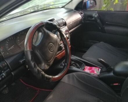 Синий Опель Омега, объемом двигателя 2 л и пробегом 270 тыс. км за 3000 $, фото 1 на Automoto.ua