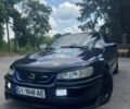 Синий Опель Омега, объемом двигателя 2 л и пробегом 329 тыс. км за 1750 $, фото 1 на Automoto.ua