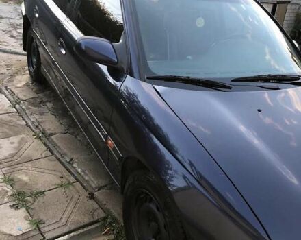 Синий Опель Омега, объемом двигателя 2.5 л и пробегом 322 тыс. км за 1000 $, фото 2 на Automoto.ua