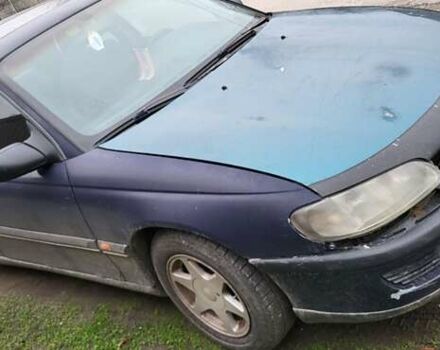 Синий Опель Омега, объемом двигателя 2 л и пробегом 207 тыс. км за 1550 $, фото 2 на Automoto.ua