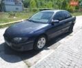 Синий Опель Омега, объемом двигателя 2.5 л и пробегом 350 тыс. км за 1600 $, фото 1 на Automoto.ua