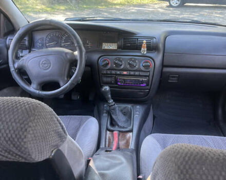 Синий Опель Омега, объемом двигателя 2.5 л и пробегом 480 тыс. км за 1799 $, фото 14 на Automoto.ua