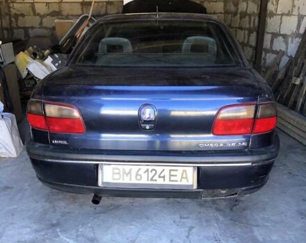 Синий Опель Омега, объемом двигателя 2.5 л и пробегом 322 тыс. км за 1000 $, фото 1 на Automoto.ua