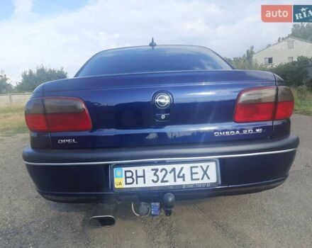 Синій Опель Омега, об'ємом двигуна 2 л та пробігом 305 тис. км за 3300 $, фото 11 на Automoto.ua
