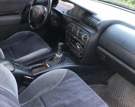 Синий Опель Омега, объемом двигателя 2.5 л и пробегом 322 тыс. км за 1000 $, фото 3 на Automoto.ua