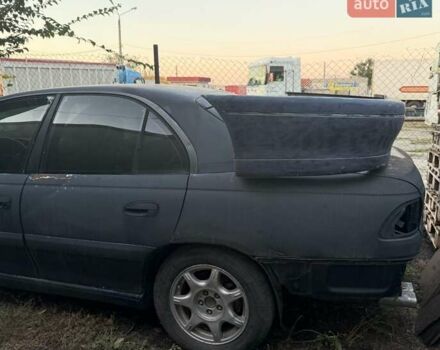 Синий Опель Омега, объемом двигателя 3 л и пробегом 560 тыс. км за 1500 $, фото 3 на Automoto.ua