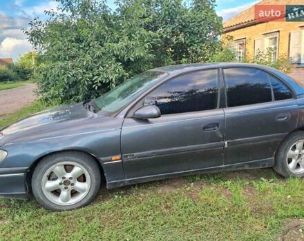 Синий Опель Омега, объемом двигателя 2.5 л и пробегом 285 тыс. км за 2000 $, фото 15 на Automoto.ua