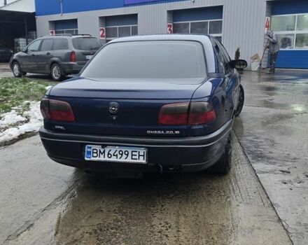 Синий Опель Омега, объемом двигателя 2 л и пробегом 345 тыс. км за 2800 $, фото 2 на Automoto.ua