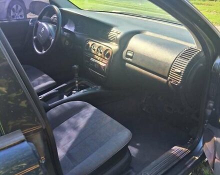 Синий Опель Омега, объемом двигателя 2.5 л и пробегом 285 тыс. км за 2000 $, фото 14 на Automoto.ua