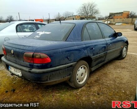 Синий Опель Омега, объемом двигателя 2 л и пробегом 340 тыс. км за 1800 $, фото 3 на Automoto.ua