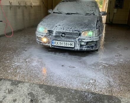 Синий Опель Омега, объемом двигателя 2.5 л и пробегом 133 тыс. км за 1400 $, фото 4 на Automoto.ua