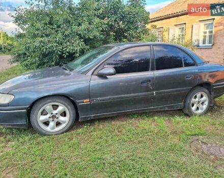 Синий Опель Омега, объемом двигателя 2.5 л и пробегом 285 тыс. км за 2000 $, фото 13 на Automoto.ua