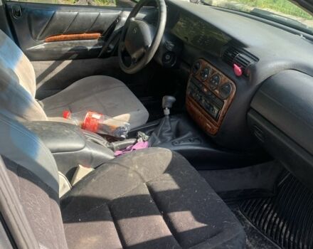 Синий Опель Омега, объемом двигателя 2.5 л и пробегом 133 тыс. км за 1400 $, фото 5 на Automoto.ua